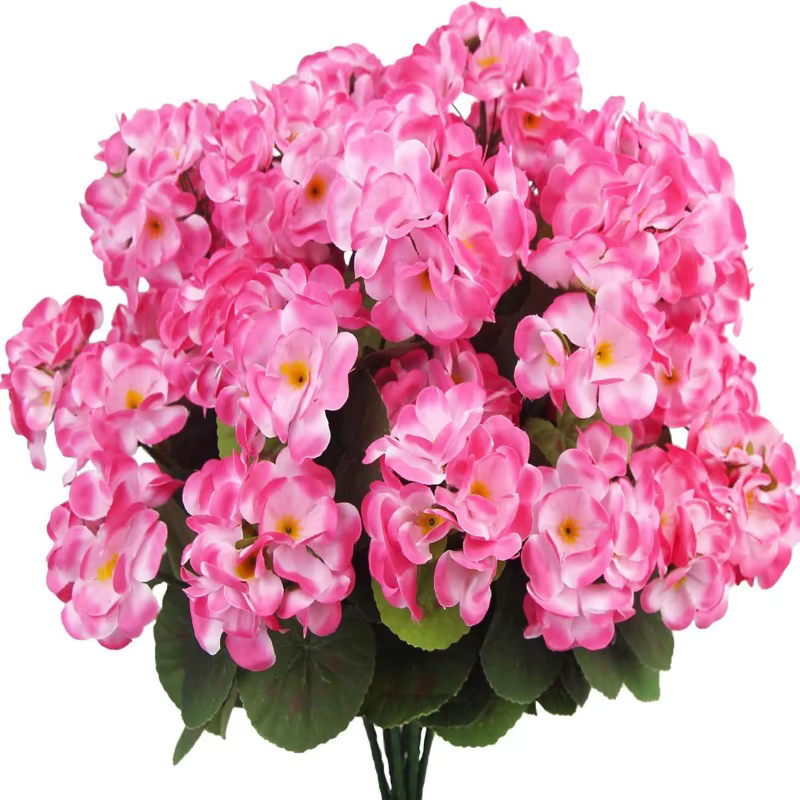 Fleurs artificielles violettes de printemps, plantes artificielles avec begonias et géraniums en soi
