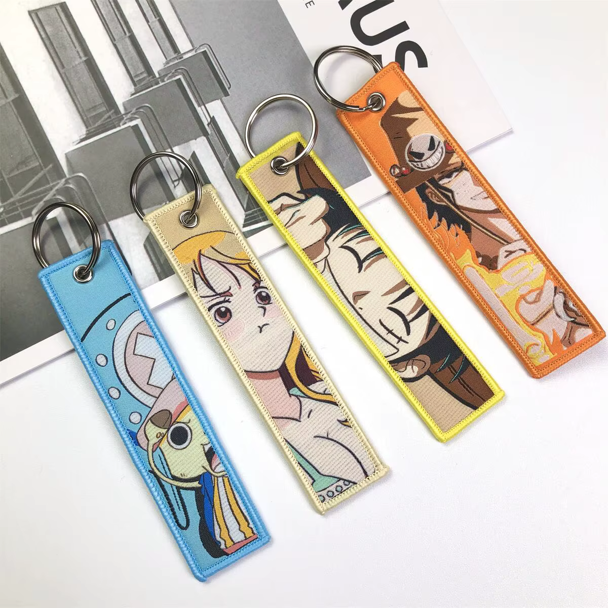 Porte-clés Anime une pièce avec mignon Jet Manga brodé, étiquette de clé à la mode pour accessoire de bijoux, porte-anneau, cadeau pour les Fans d'anime