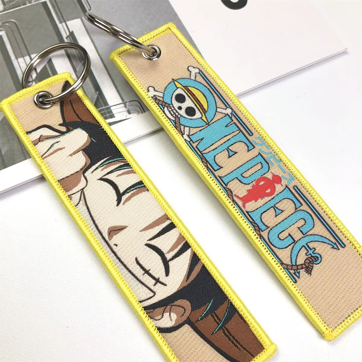 Porte-clés Anime une pièce avec mignon Jet Manga brodé, étiquette de clé à la mode pour accessoire de bijoux, porte-anneau, cadeau pour les Fans d'anime