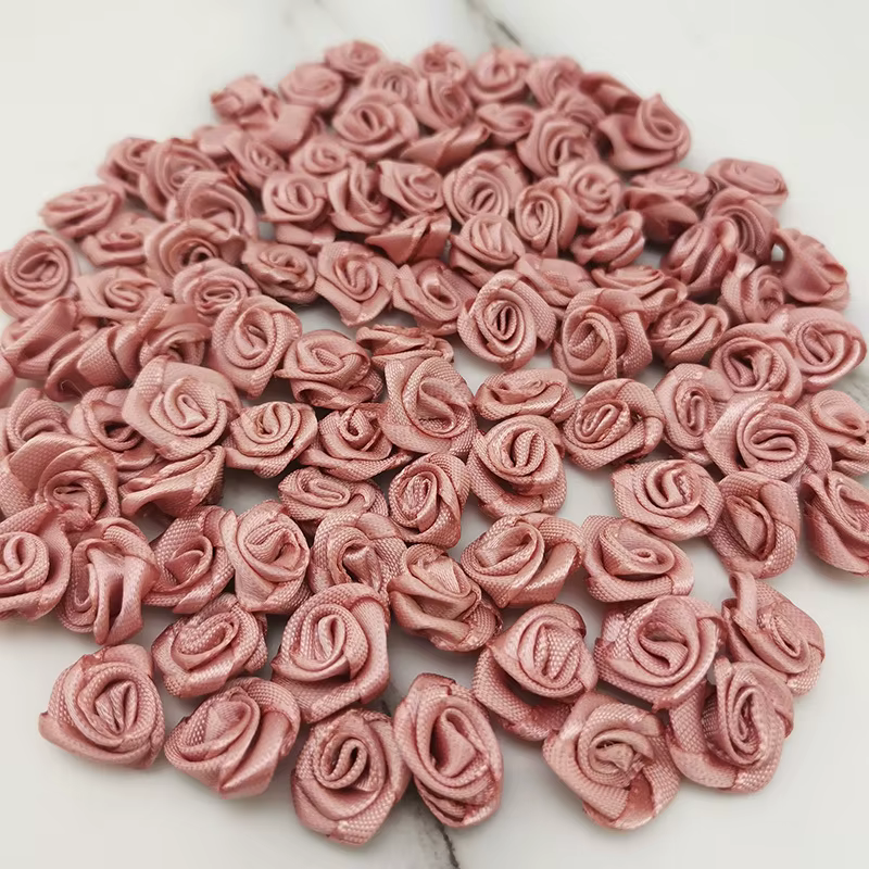 Mini fleurs artificielles en ruban de satin rose