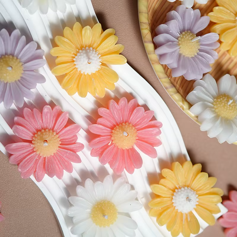 Bougies colorées en forme de marguerite