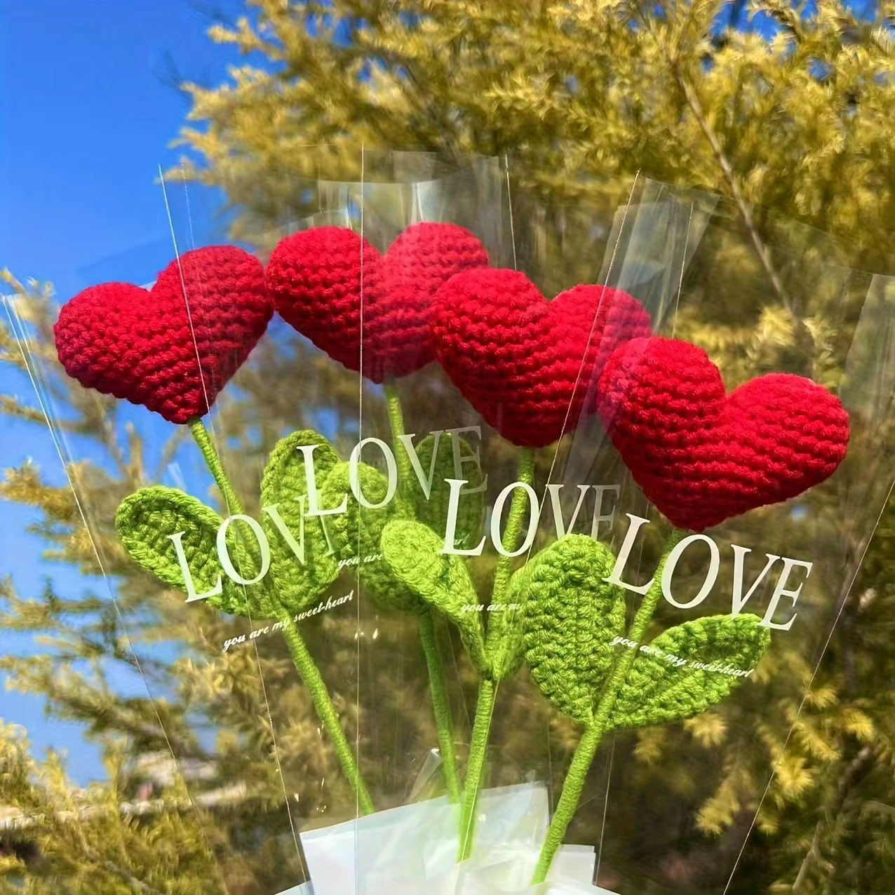Bouquet de fleurs en forme de cœur au crochet fait à la main