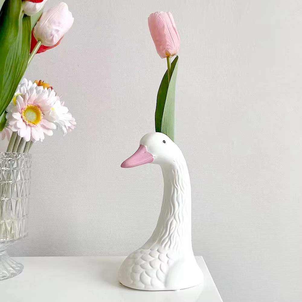 Vase à fleurs rose doré
