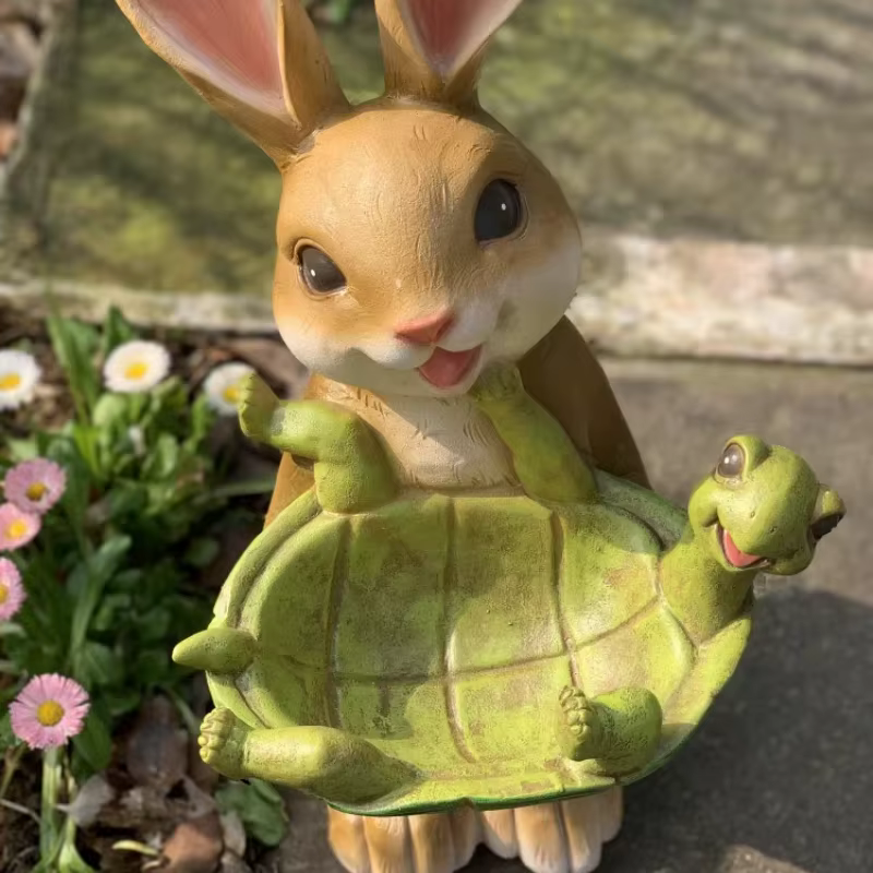 Pot de fleur lapin tenant tortue
