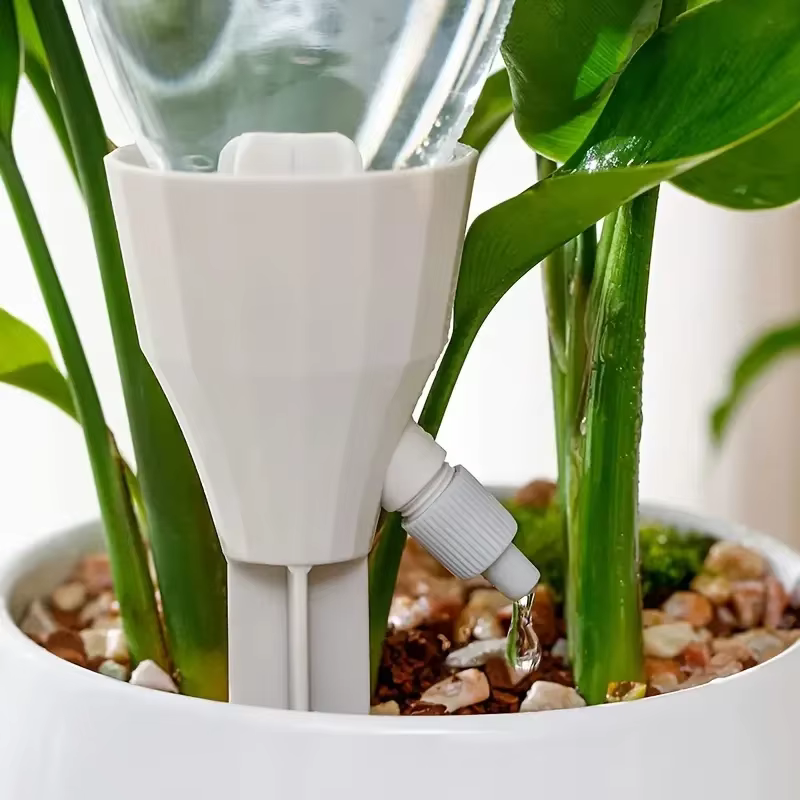 Dispositif d'arrosage automatique de fleurs pour plantes en pot à la maison
