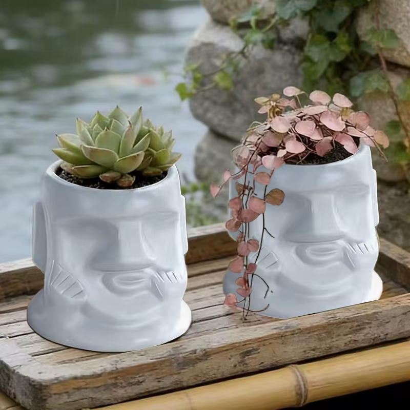 Pot de fleurs en céramique créatif en forme de visage de Moaï