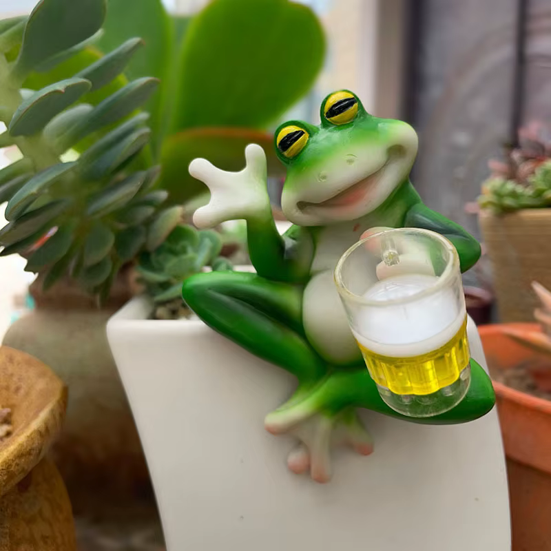 Décorations de cintre de plante de Figurine de grenouille pour des Pots