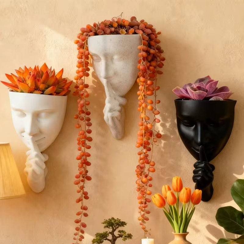 Pot de fleurs mural artistique en forme de visage