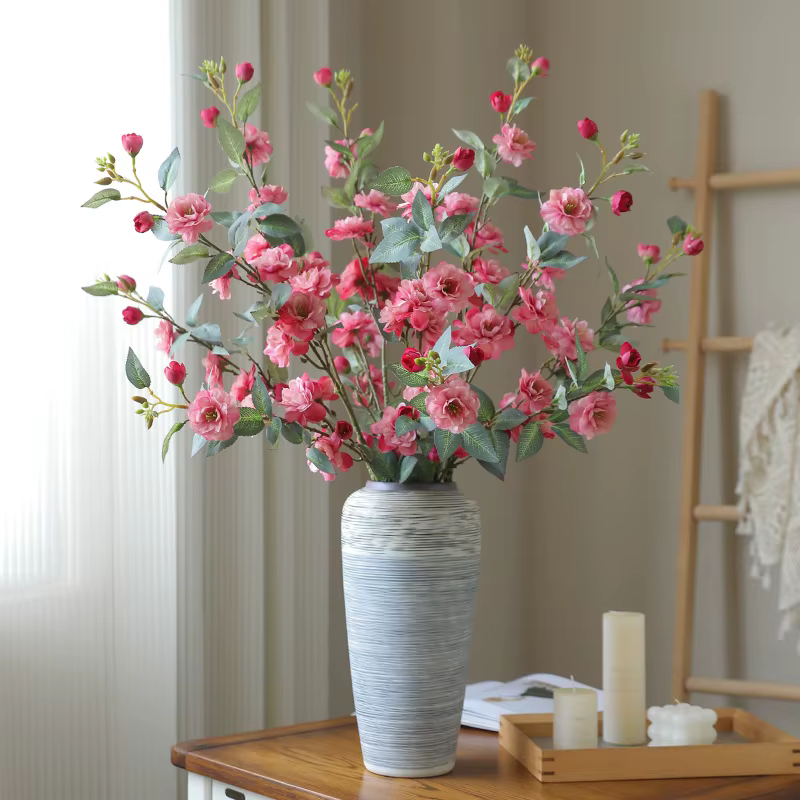 Nouvelle camélia fleur simulée longue branche avec fausses feuilles