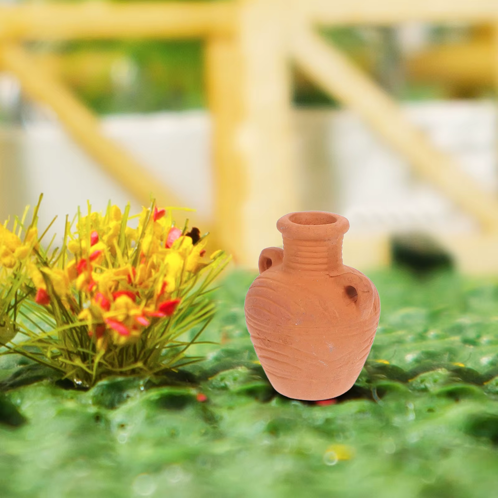 Mini pot de fleurs en terre cuite au design vintage