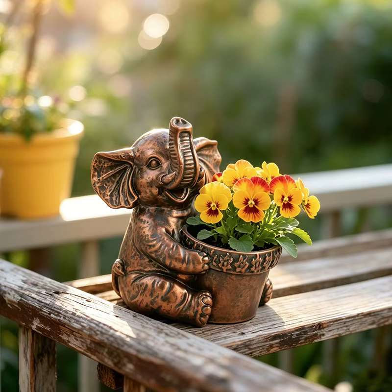 Pot de fleurs en bronze antique en forme d'éléphant pour fleurs de pâquerette