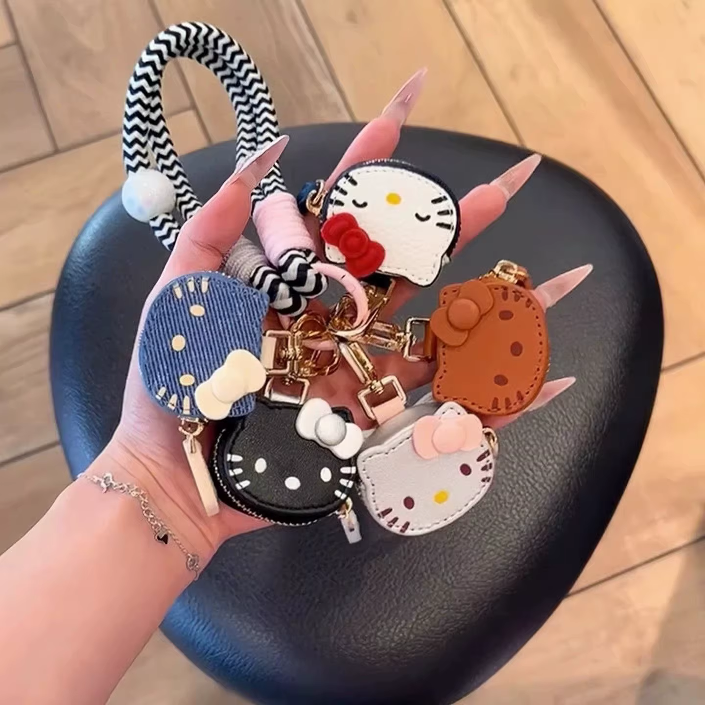 Porte-clés mini sac en cuir Hello Kitty mignon, texture haut de gamme, accessoire pour jeune fille, décoration créative pour sac quotidien, cadeau pour amis