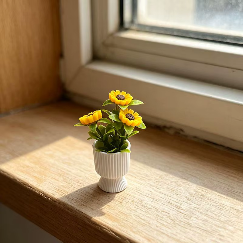 Ornement miniature de tournesol en pot