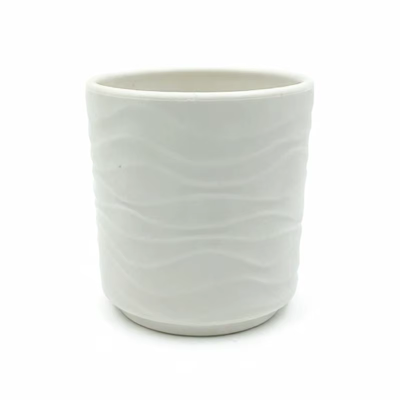 Les pots de fleurs simples en forme de vague