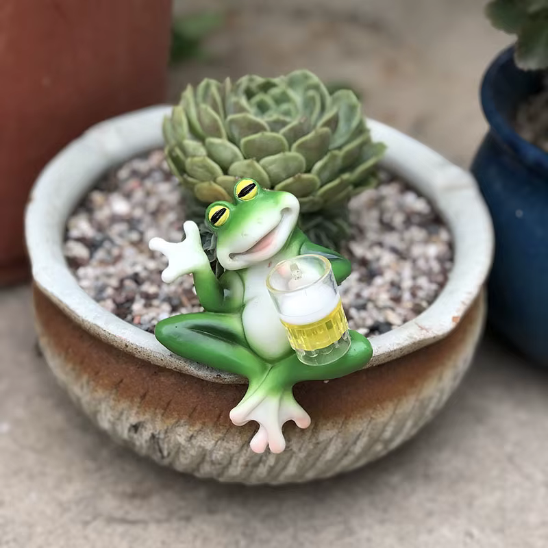 Décorations de cintre de plante de Figurine de grenouille pour des Pots