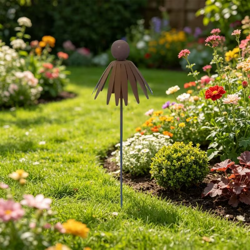 Sculpture plante en fer sur piquet d'art jardin en échinacée rouillée