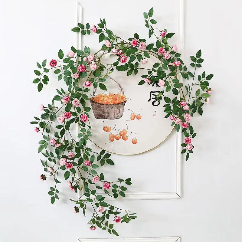 Guirxiété de plantes vertes artificielles en rotin rose