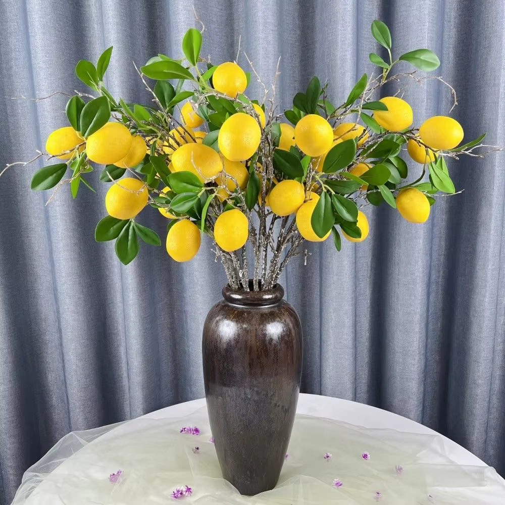 Feuilles vertes, branche de citron artificielle