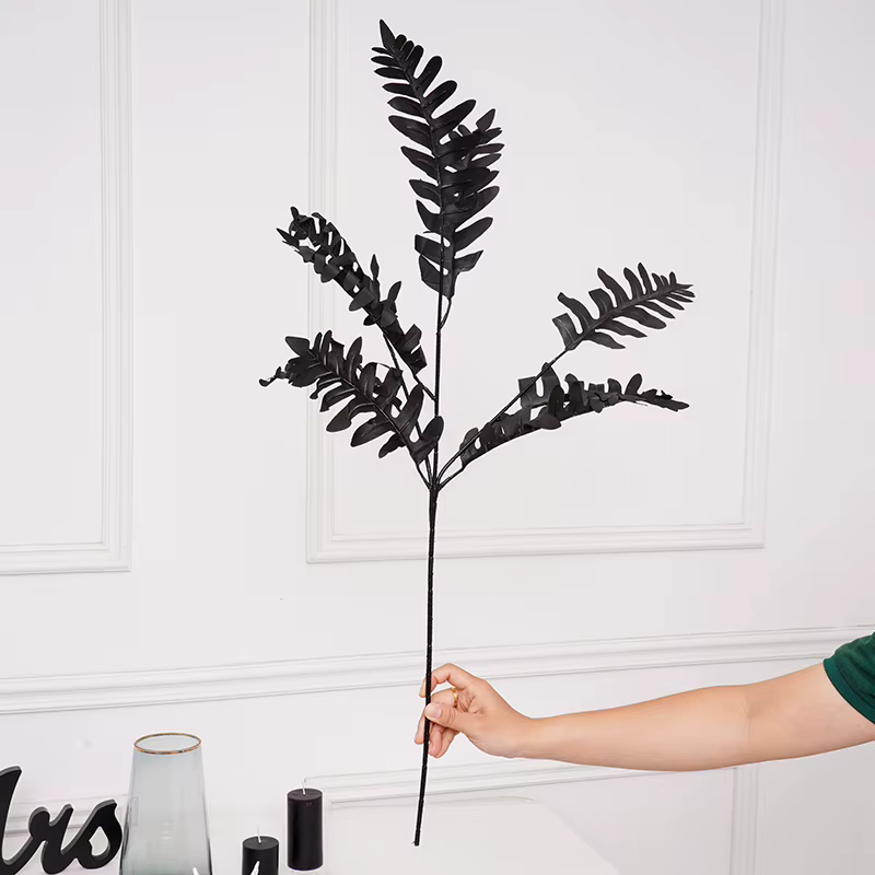 Feuilles de plantes artificielles noires en soie