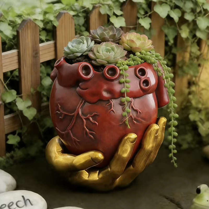 Pot de fleurs en résine rouge en forme de cœur anatomique avec support doré pour plantes succulentes