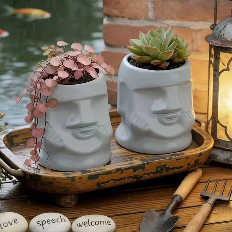Pot de fleurs en céramique créatif en forme de visage de Moaï