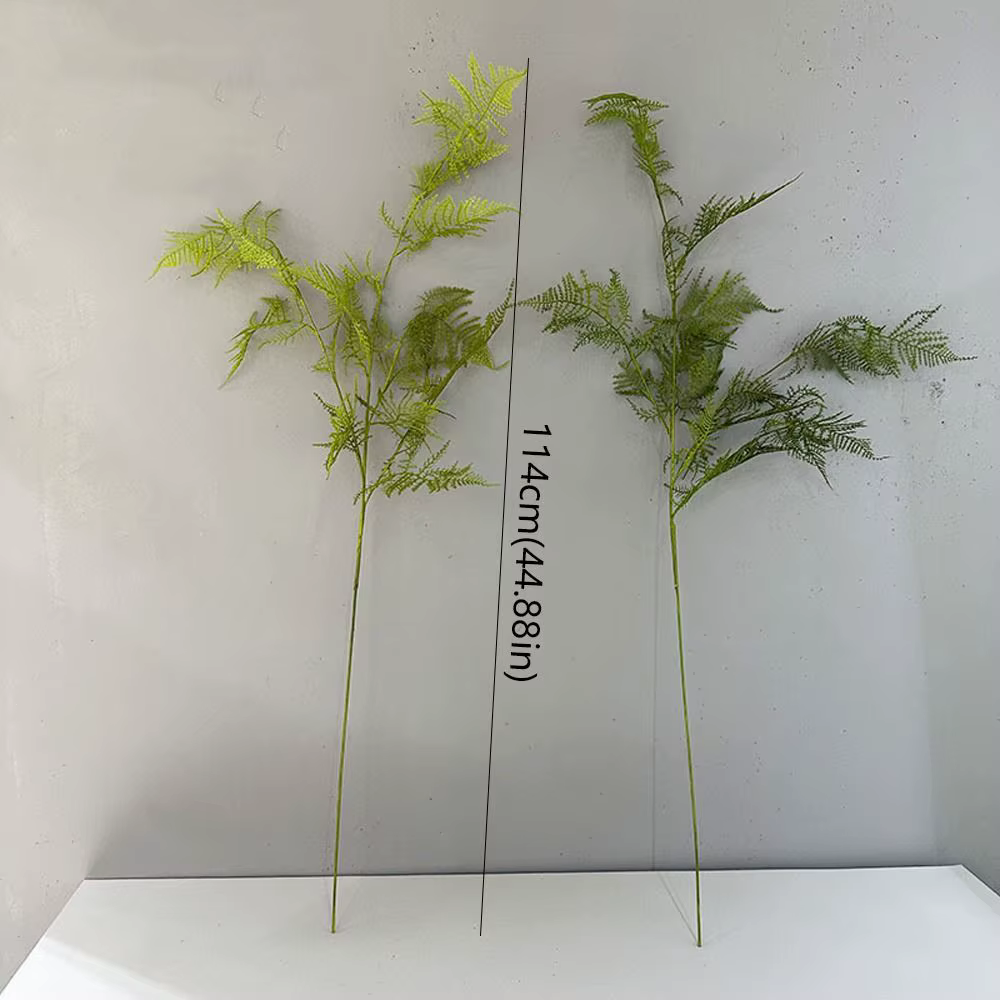 Grandes branches de plantes artificielles en fougère