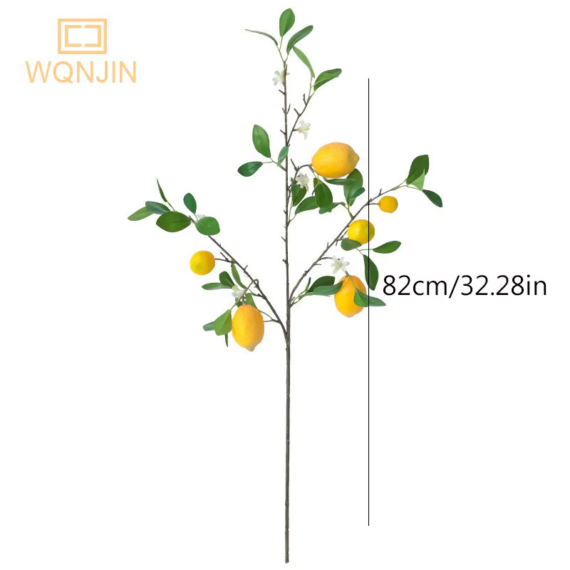 Branche de citron de luxe avec feuilles vertes