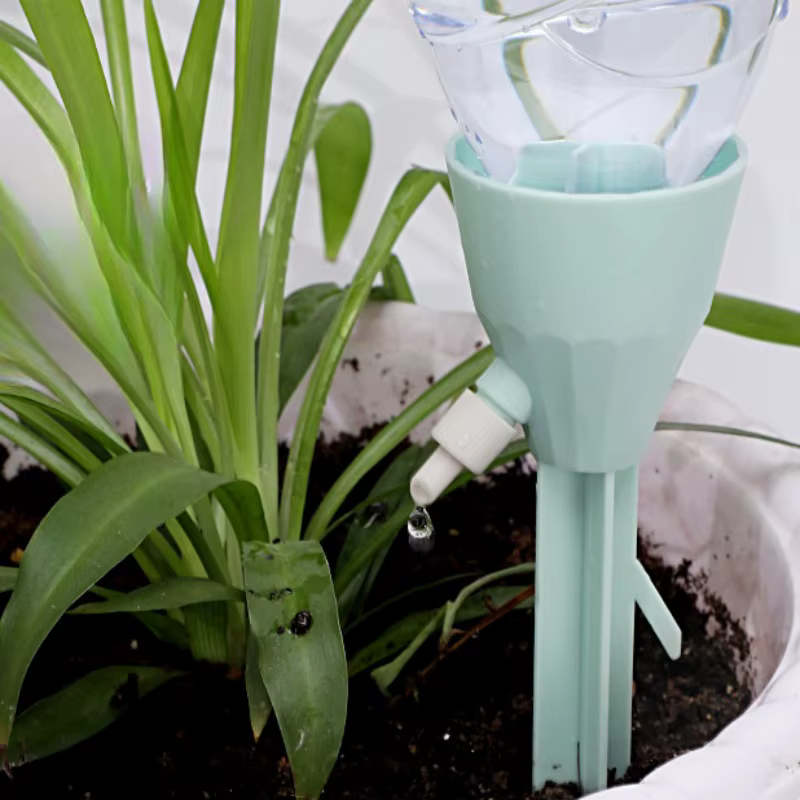Dispositif d'arrosage automatique de fleurs pour plantes en pot à la maison