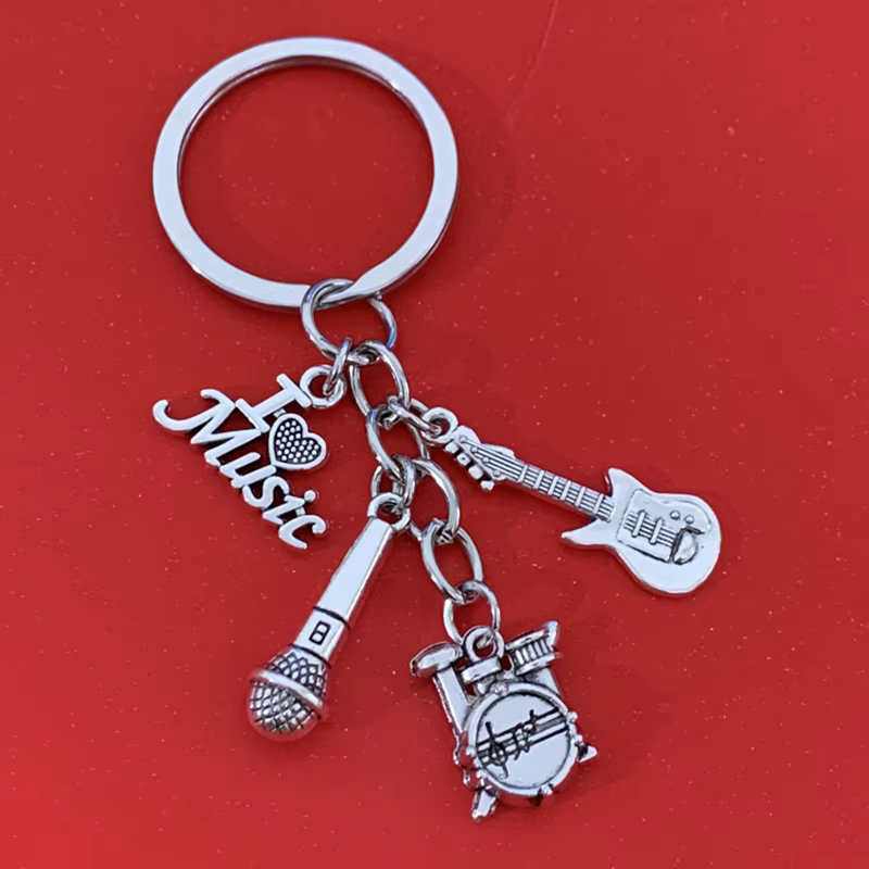 1 pièce de porte-clés en alliage de musique classique, accessoire de décoration de bijoux avec tambour et microphone de guitare