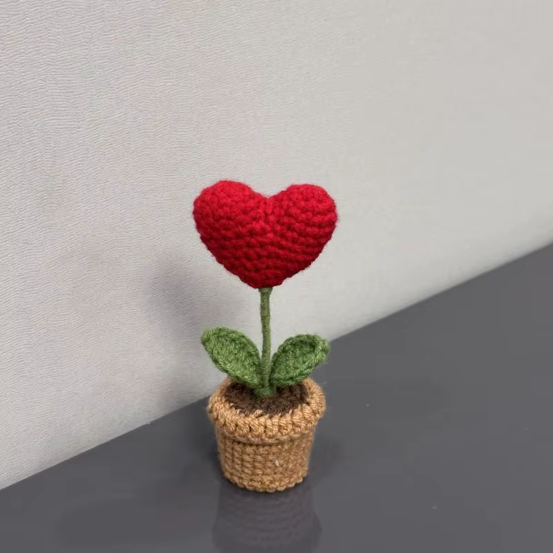Petite plante en pot tissée à crochet