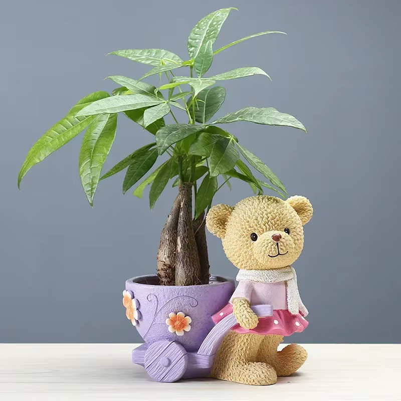 Pot de fleurs de dessin animé pour la maison