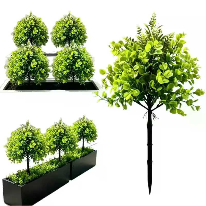 Plantes vertes artificielles sur piquet