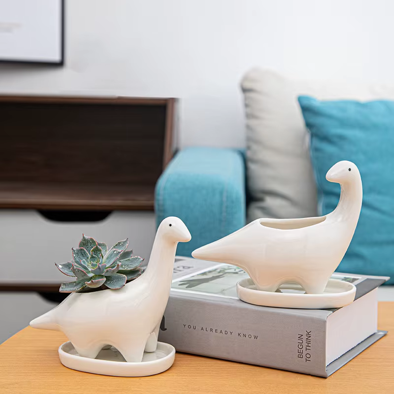 Pot de fleur de dinosaure en céramique blanche