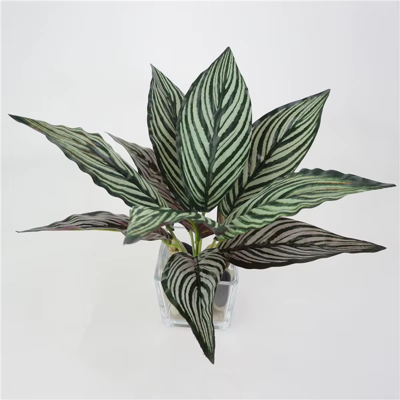 Plante verte artificielle en plastique