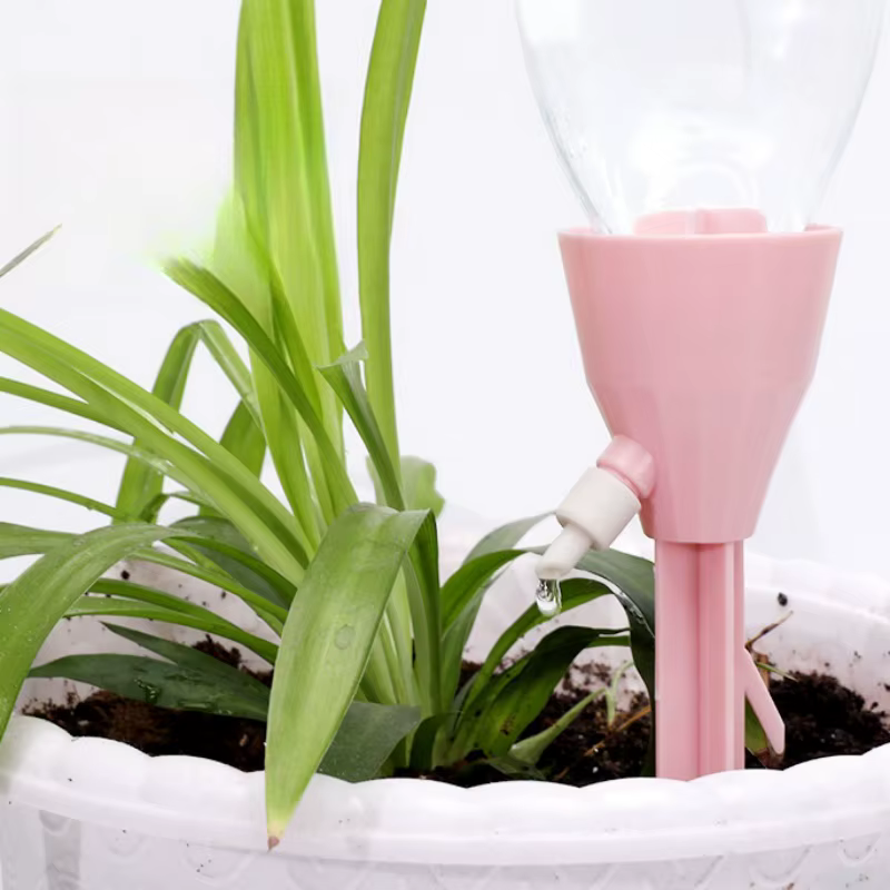 Dispositif d'arrosage automatique de fleurs pour plantes en pot à la maison
