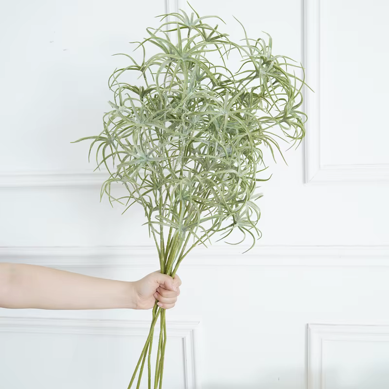 Branches artificielles de plantes vertes
