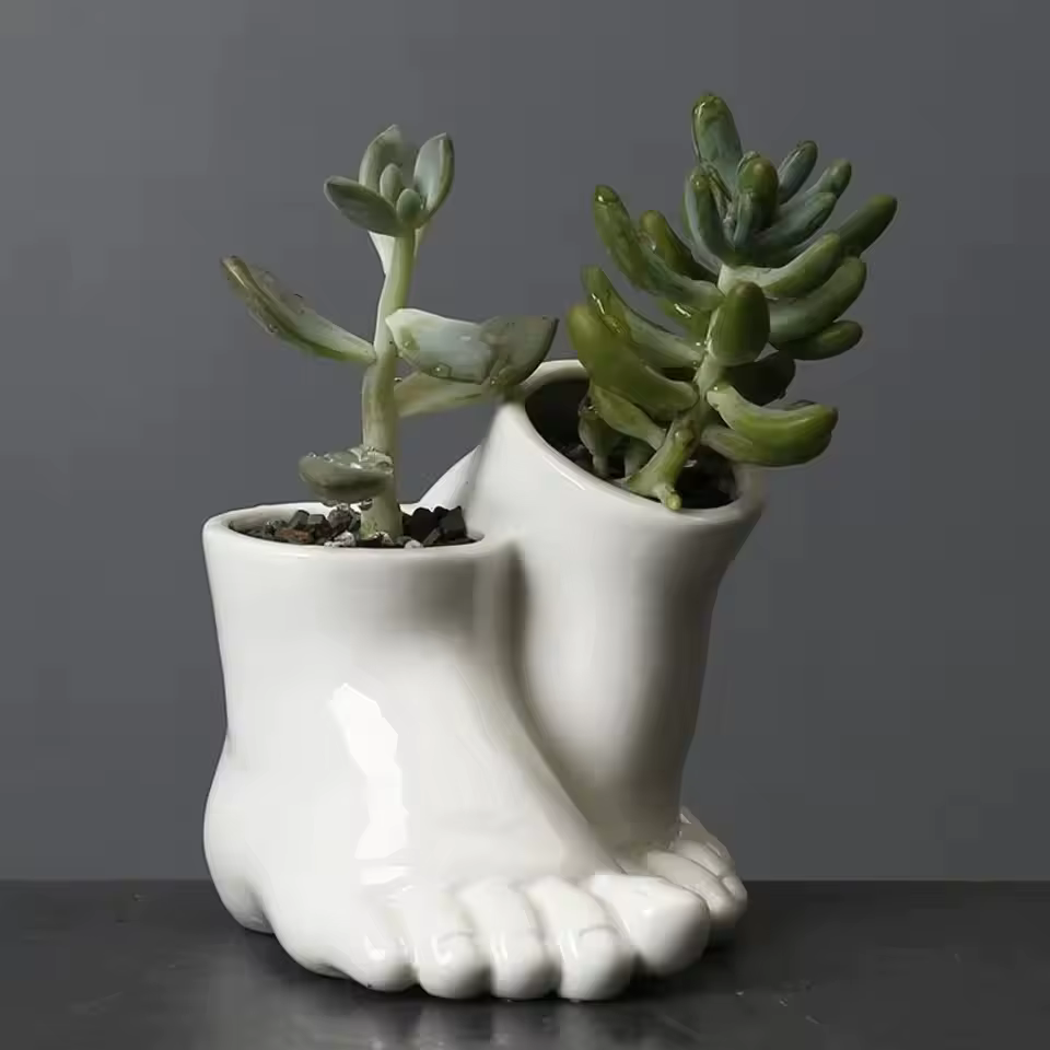 Pot de fleurs en céramique créatif en forme de pied