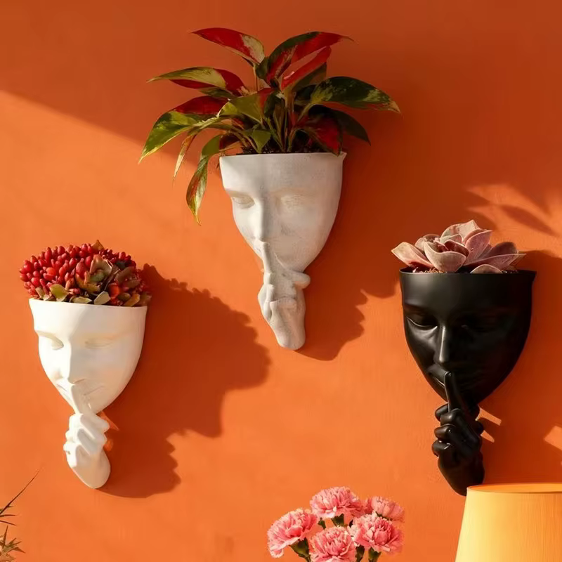 Pot de fleurs mural artistique en forme de visage