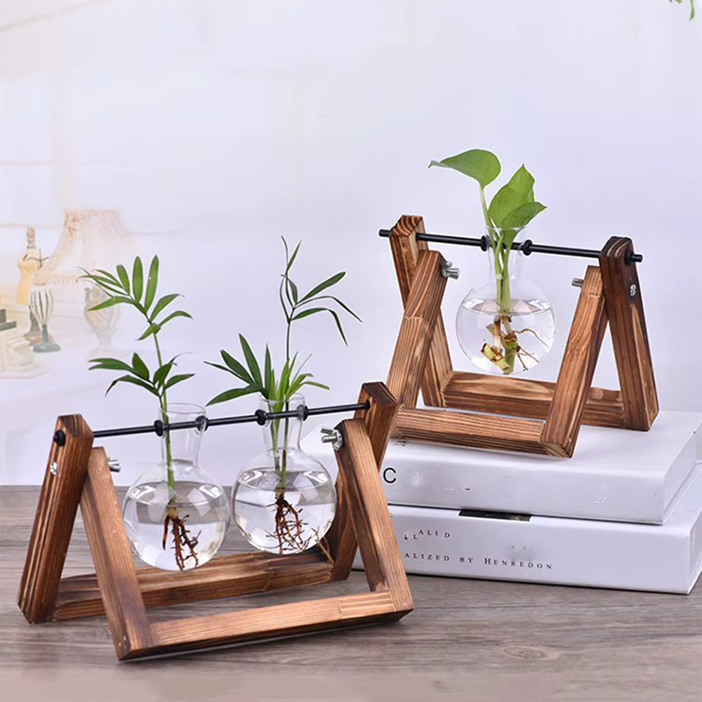 Pot de fleurs en verre avec cadre en bois