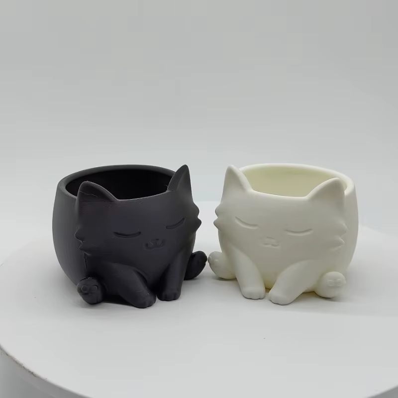 Pot de fleurs en forme de chat mignon