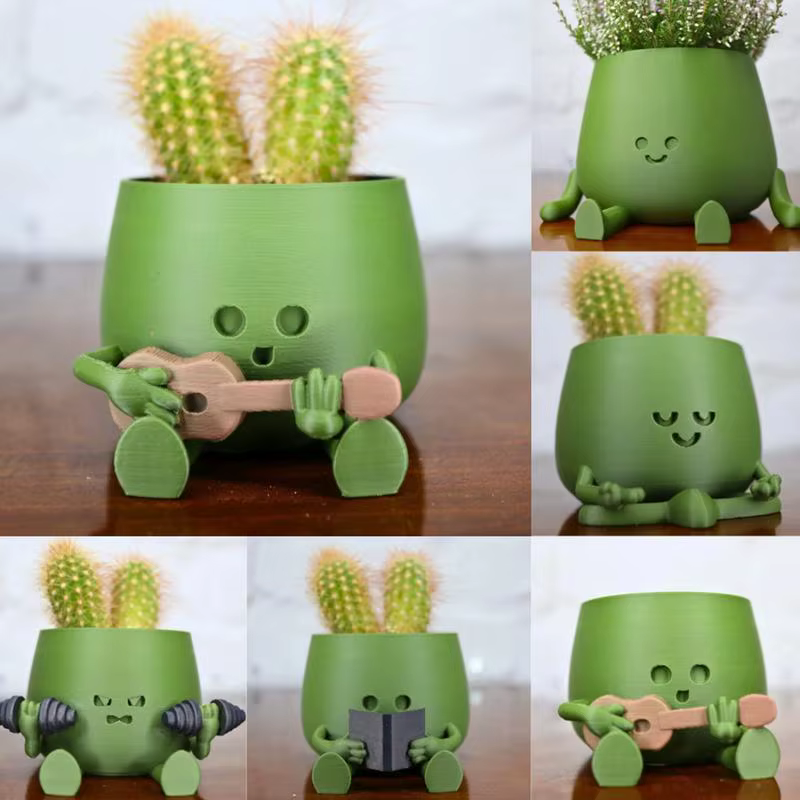 Pot de plante en résine avec visage souriant