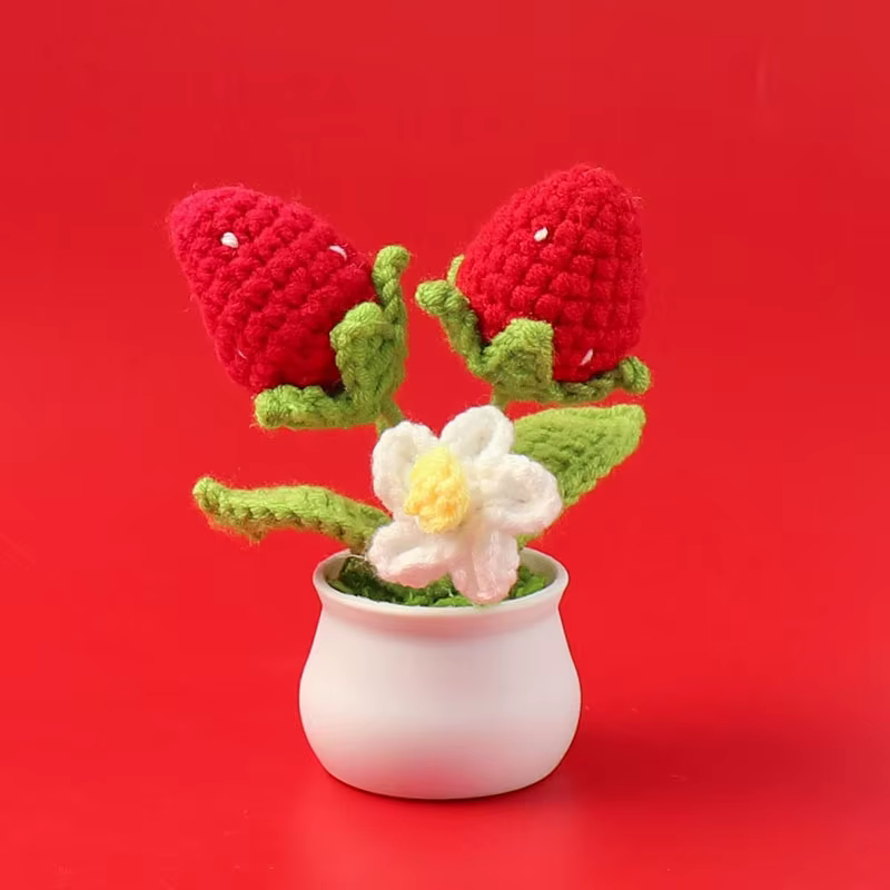 Fleur tricotée en forme de fraise