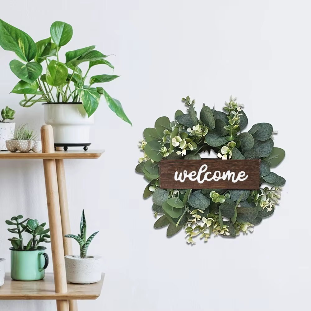 Couronne d'eucalyptus vert avec signe de bienvenue