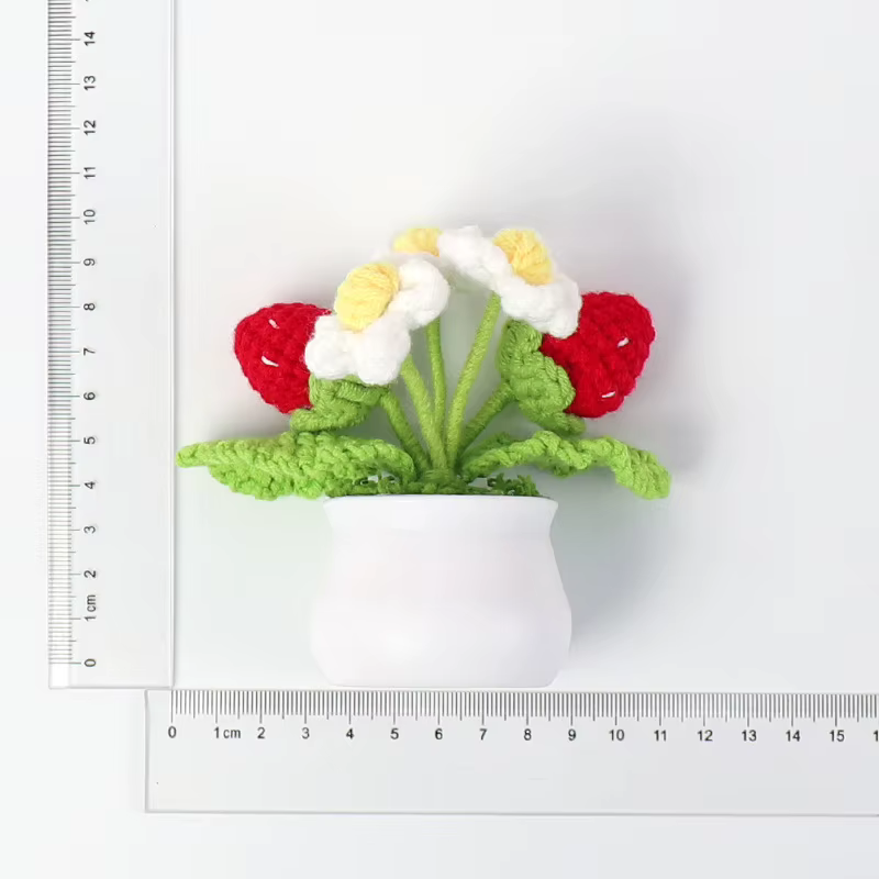 Fleur tricotée en forme de fraise