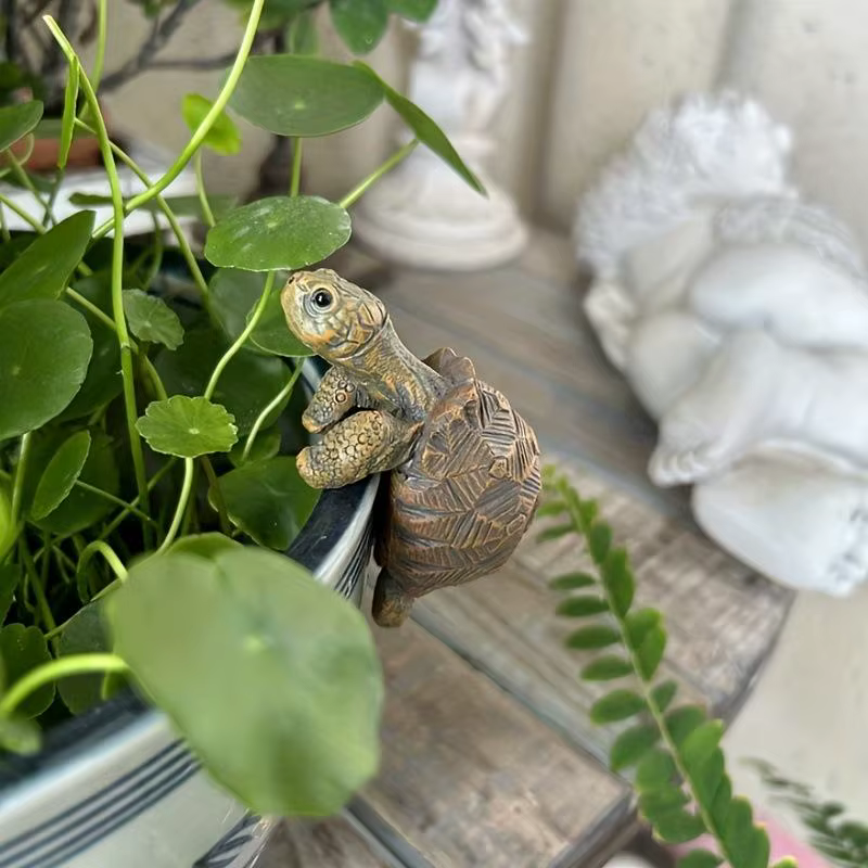 Support de pot de plante en forme de tortue