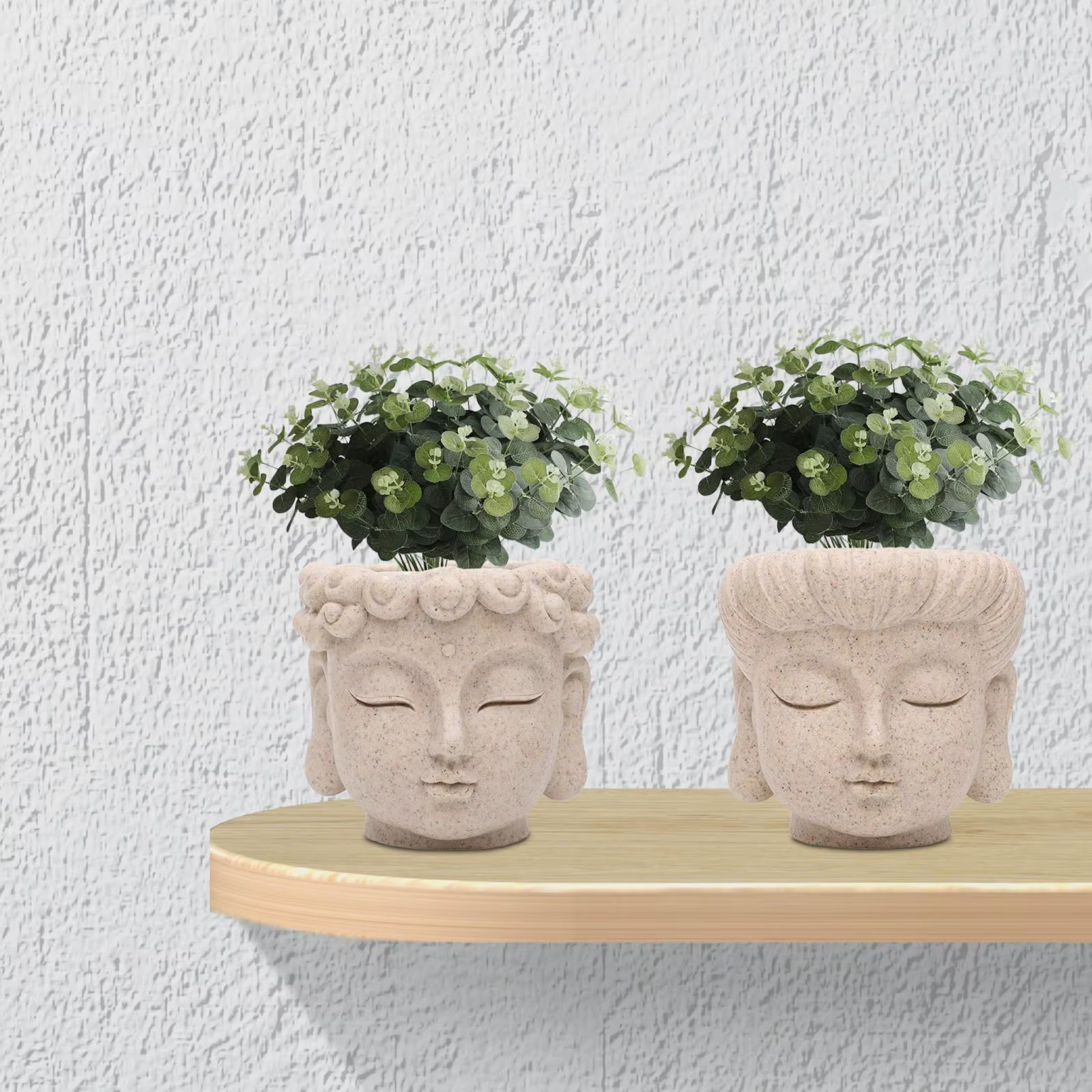 Pot de fleurs en forme de tête de Bouddha