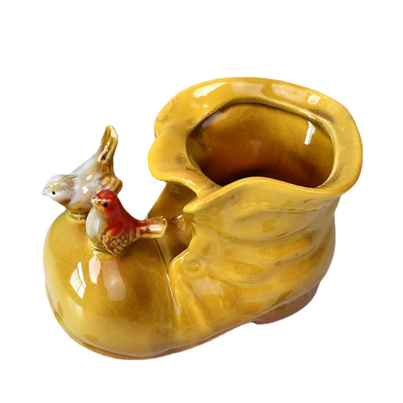 Pot de fleur artisanal en céramique en forme de chaussure