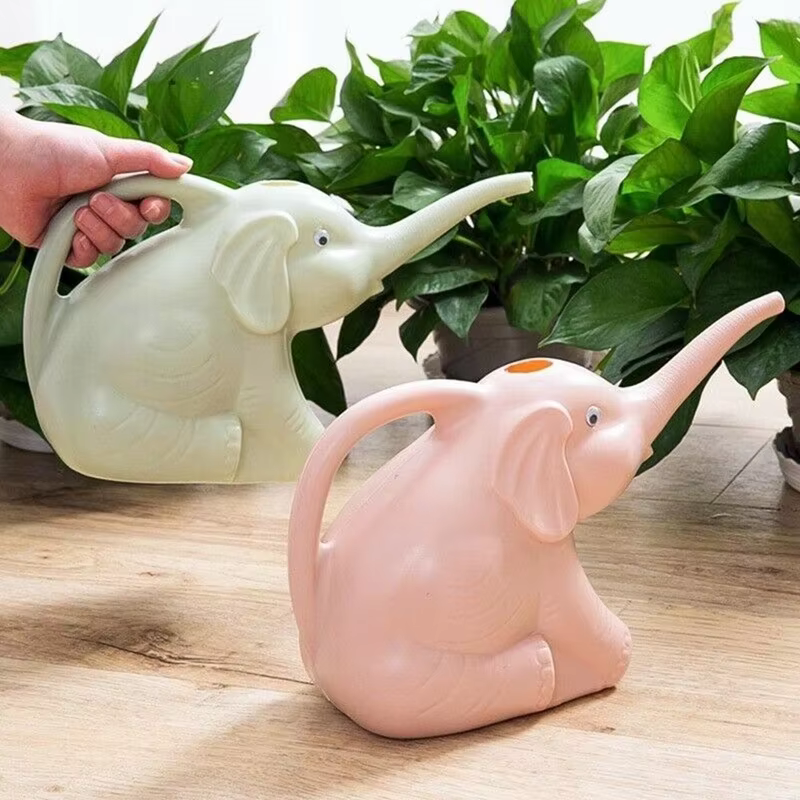 Arrosoir en plastique en forme d'éléphant