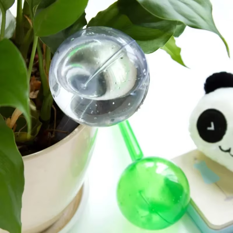 Nouveau Globes d'arrosage automatique canettes d'eau pour plantes fleurs Mini plante