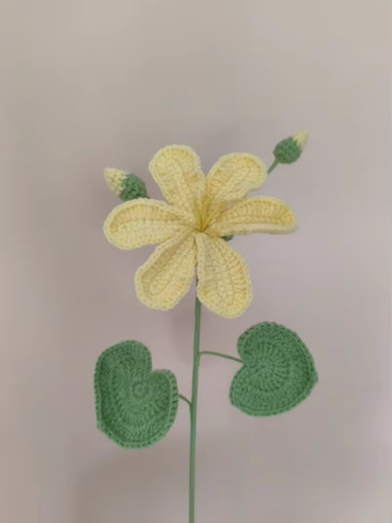 Une fleur tissée à la main